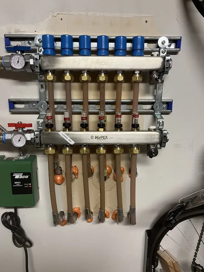 Plumber performing Gas Leak Detection at a residential property in Milford